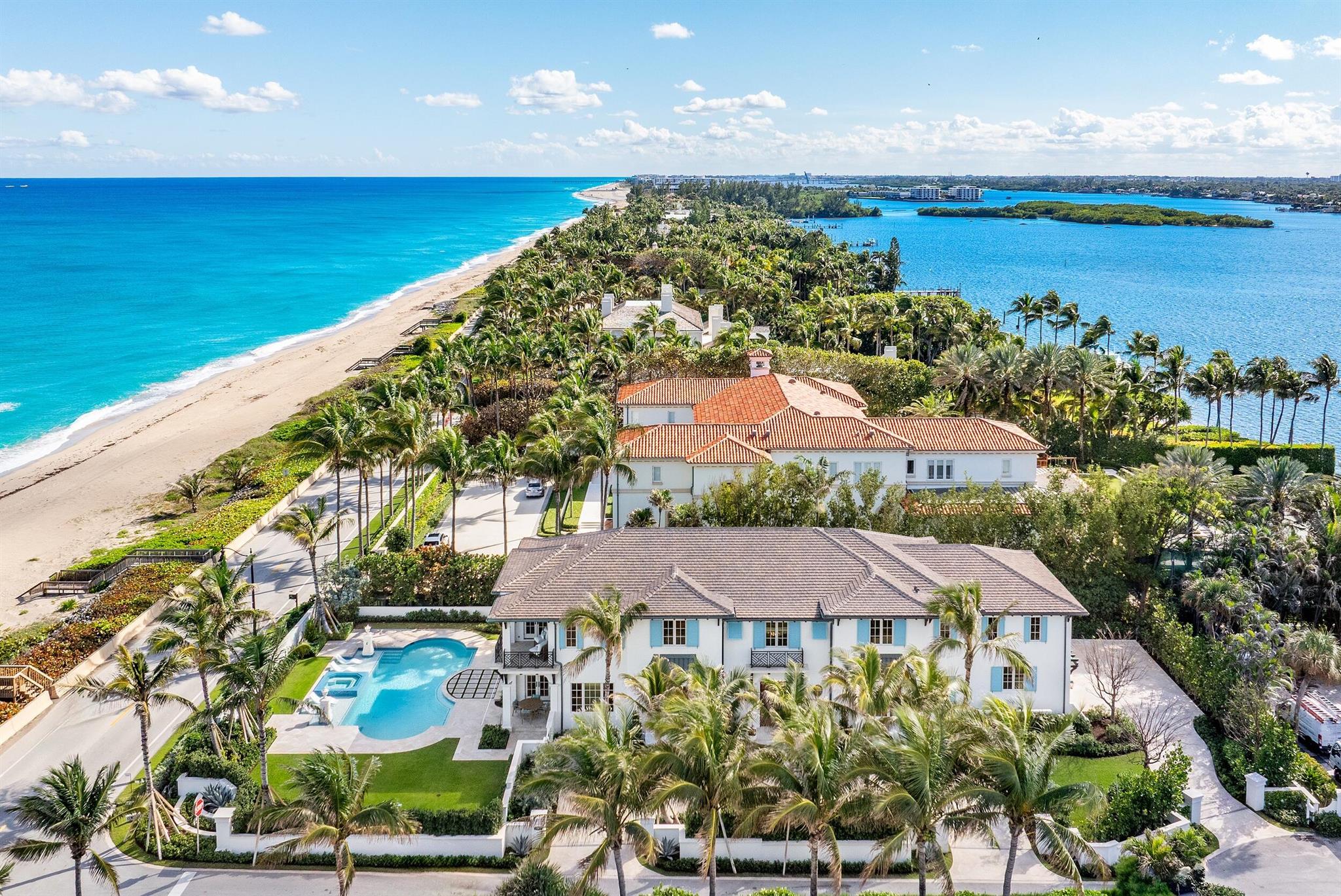 Spectacular, Newly Built Oceanfront Estate with 6 bedrooms, 7 full baths, 1 powder room, and sweeping views of the Atlantic Ocean. This immaculate British West Indies home features beautiful finishes throughout including stunning hardwood and marble flooring, detailed ceilings, and exemplifies the highest standard in craftsmanship and attention to detail. Welcoming foyer leads to the formal living room with gorgeous, beamed ceiling. Chef's kitchen with top-of-the-line appliances, large U-shaped island with seating for 6, and breakfast area with peeks of the ocean. Additional interior highlights include formal dining room, light-filled family room, and office with floor-to-ceiling built-ins. Elegant, oceanfront Primary Suite features sitting room, dual bathrooms, and dual walk-in closets.