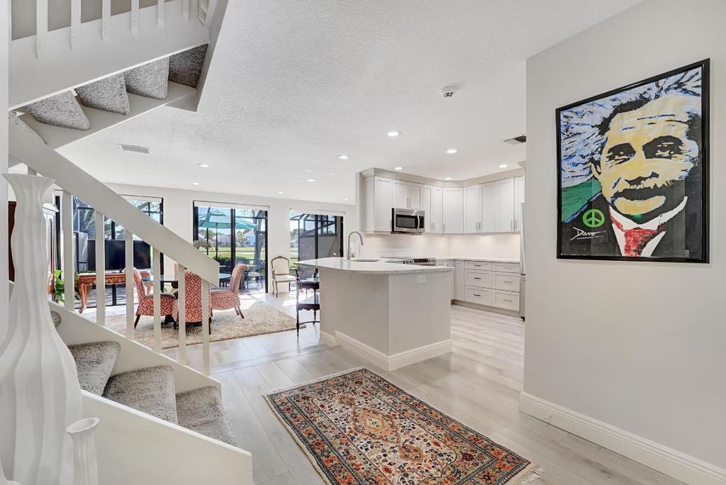 Photo of 828 Windermere Way, Palm Beach Gardens, FL 33418 (MLS # R11071965)