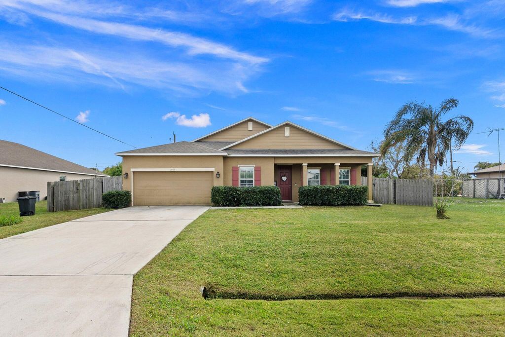 Photo of 1010 SW Cornelia Avenue, Port Saint Lucie, FL 34953 (MLS # R10965479)