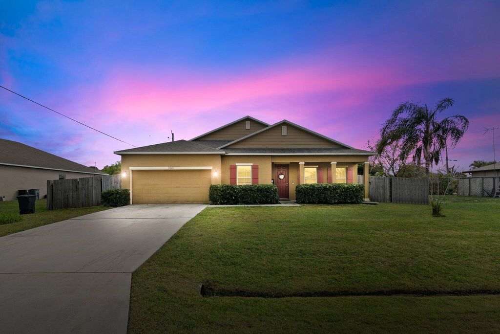 Photo of 1010 SW Cornelia Avenue, Port Saint Lucie, FL 34953 (MLS # R10965479)