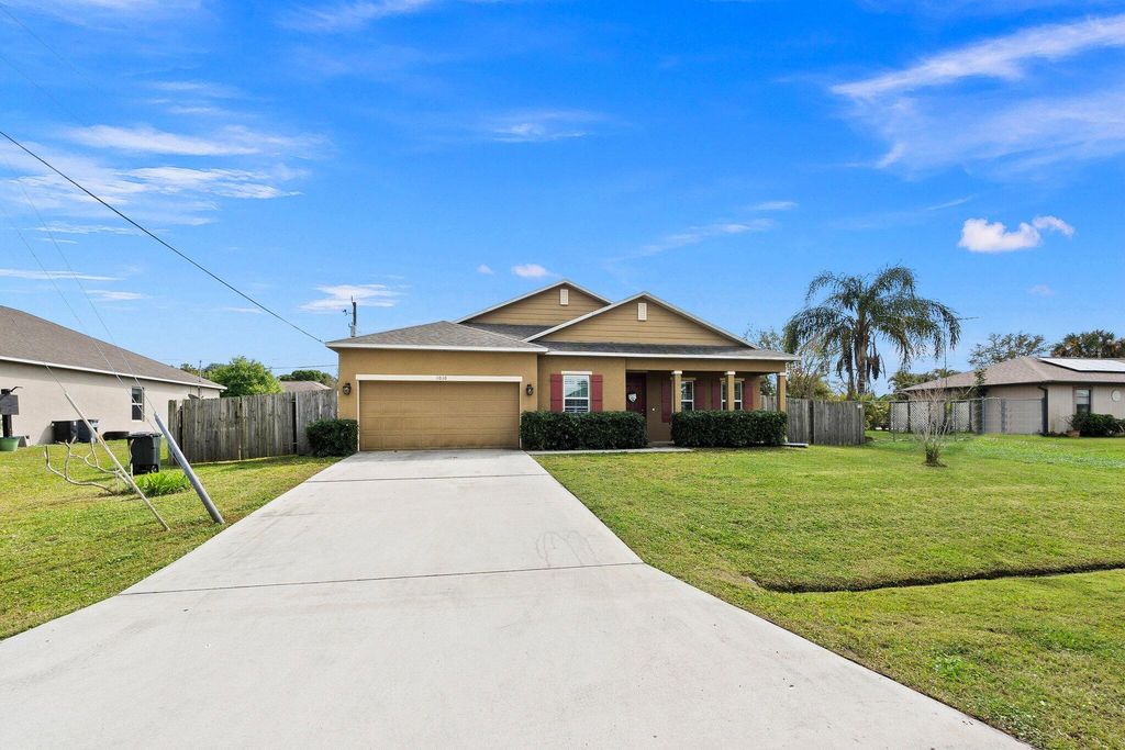 Photo of 1010 SW Cornelia Avenue, Port Saint Lucie, FL 34953 (MLS # R10965479)