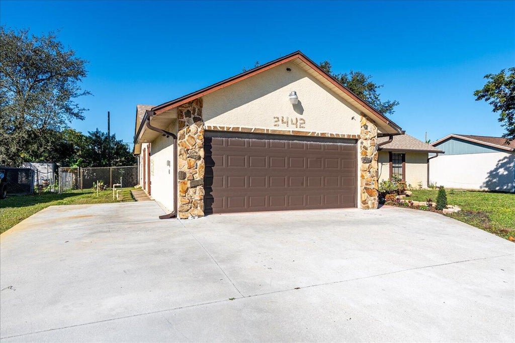 Photo of 2442 SW Lafayette St, Port Saint Lucie, FL 34984 (MLS # R11150538)