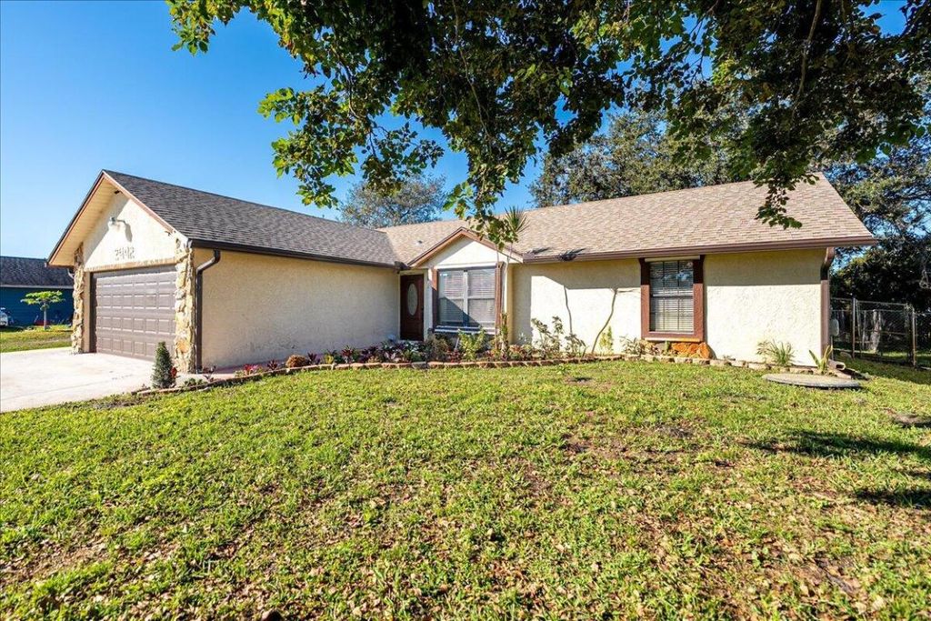 Photo of 2442 SW Lafayette St, Port Saint Lucie, FL 34984 (MLS # R11150538)