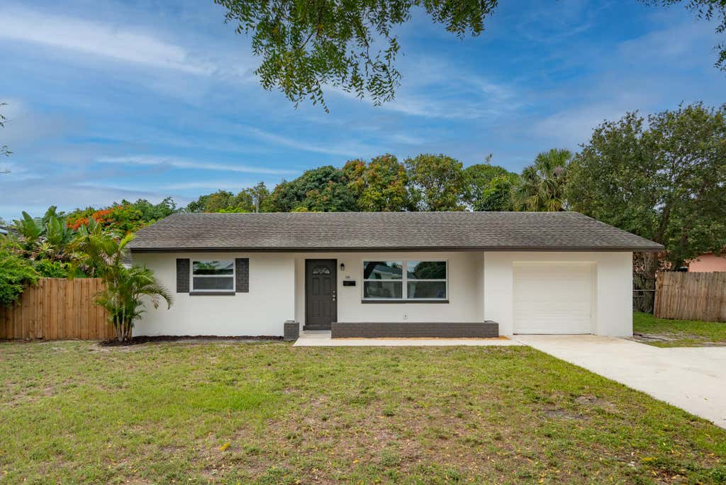 Photo of 308 Park Avenue, Lake Park, FL 33403 (MLS # B26045156)