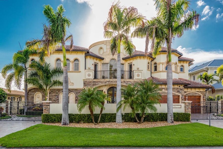 Stunning waterfront home located in the heart of Lighthouse Point. Open the doors to a grand staircase. Home has 5 bedrooms and 6 baths, including a luxurious master suite with 3 walk-in closets, a private den, and balcony. Features include a waterfront pub, large theater, walk-in wine cellar, a rooftop and ground floor summer kitchen, ample space to entertain inside and outside the home, with expansive views throughout the entire property.