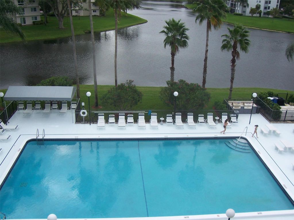 Photo of 2220 N Cypress Bend Dr #405, Pompano Beach, FL 33069 (MLS # F10396557)