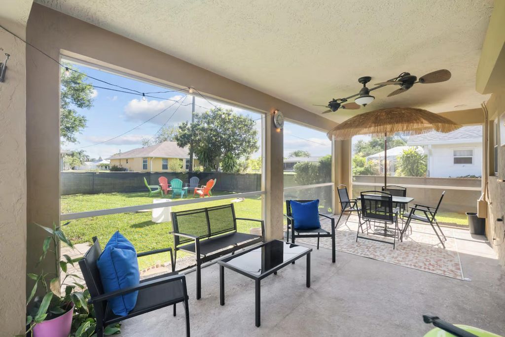 Photo of 730 SE White Avenue, Port Saint Lucie, FL 34983 (MLS # R11142287)