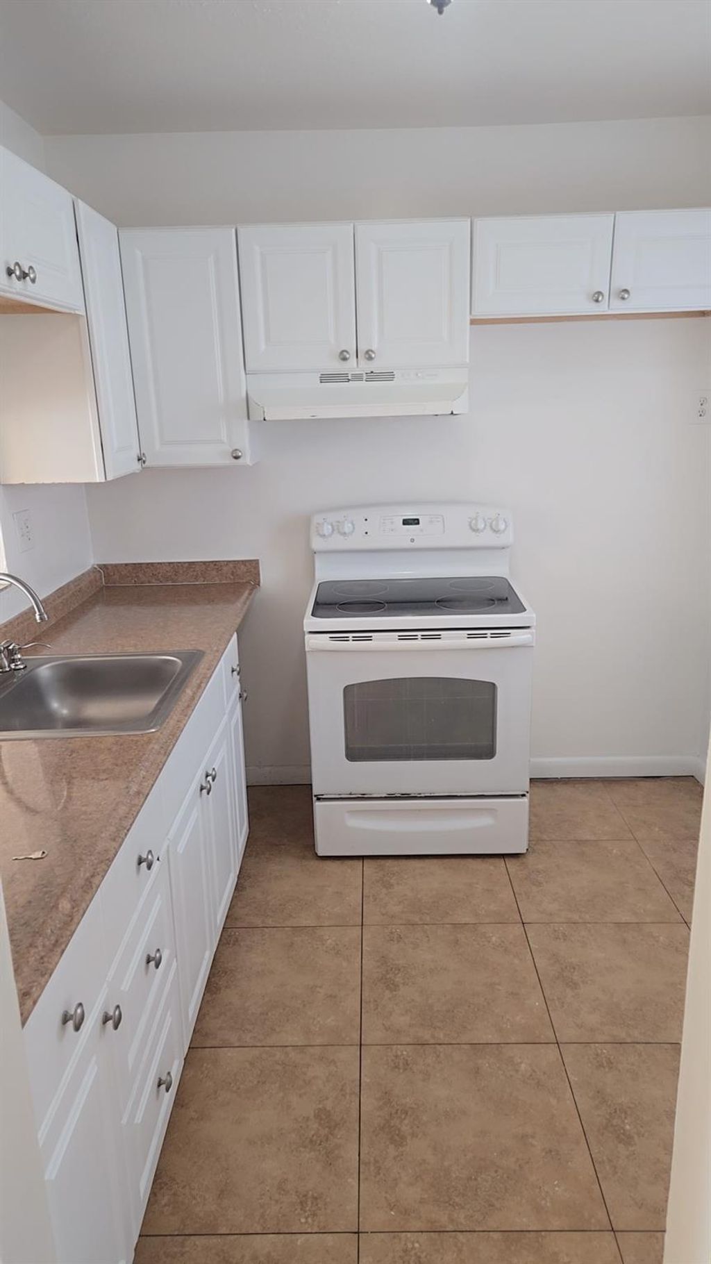 Photo of 5011 W Oakland Park Blvd #210, Lauderdale Lakes, FL 33313 (MLS # F10541365)