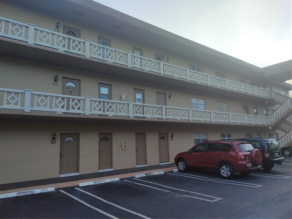 Photo of 5011 W Oakland Park Blvd #210, Lauderdale Lakes, FL 33313 (MLS # F10541365)