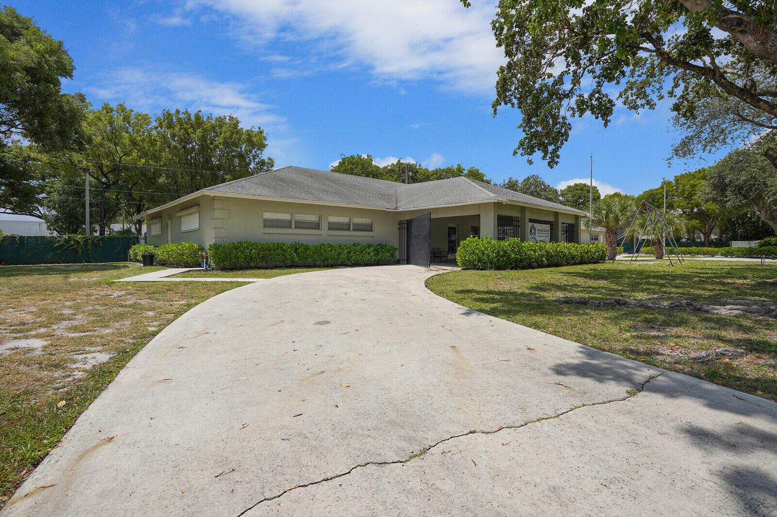 Extraordinary, CBS building boasts 5,805 square feet with ample parking, drop-off overhang, fully fenced in lot with play yard. Currently Zoned for Community Facility and approved for ''Assisted Living Facility''  .7 acres of fenced in property  5,805 square feet  Zoning privileges for Assisted Living Facility and More