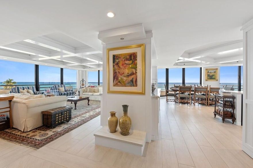 The moment you step into this corner unit masterpiece, you are welcomed by wrap-around, forever ocean views. The stunning renovations are endless... tray ceilings w/ designer insets, custom lighting, porcelain & hardwood flooring, designer built-ins, tailormade shelving, stylish hardware & more. The sleek, contemporary kitchen features an oversized island w/ storage, sparkling glass tile backsplashes, marble counters, custom cabinetry, swine coolers & built-in seating with ocean views. The primary suite includes private balconies, custom built-ins, oversized closet & a bathroom with the touches of a 5-star spa. The 2 guest suites each include a gorgeous ensuite bathroom & large closet. The 4th room office features custom built-ins that include workspaces, generous storage (click MORE)