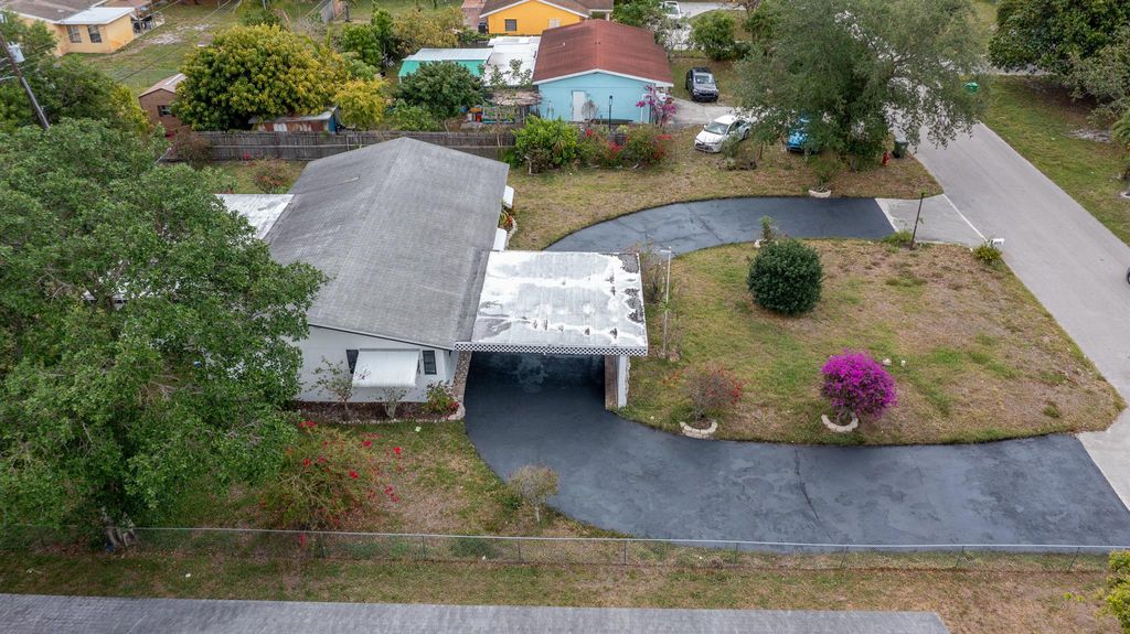 Photo of 4375 Forest Lane, Palm Springs, FL 33406 (MLS # R11109084)