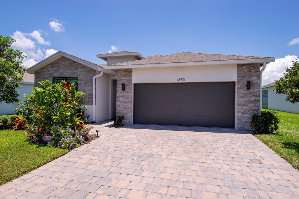Photo of 1850 NE Ocean Dunes Drive, Jensen Beach, FL 34957 (MLS # R11100779)