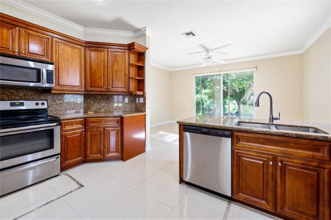 Tiny photo for 7400 NW 70th Avenue, Parkland, FL 33067 (MLS # B26042043)