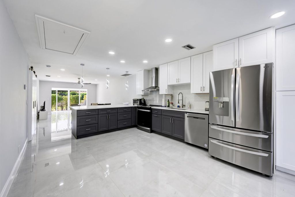 Photo of 21070 Covington Drive, Boca Raton, FL 33433 (MLS # R11133489)