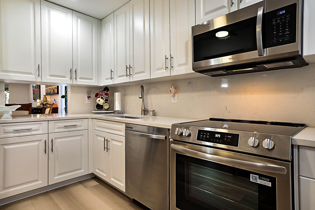 Photo of 21365 CYPRESS HAMMOCK Drive #20K, Boca Raton, FL 33428 (MLS # B26074045)