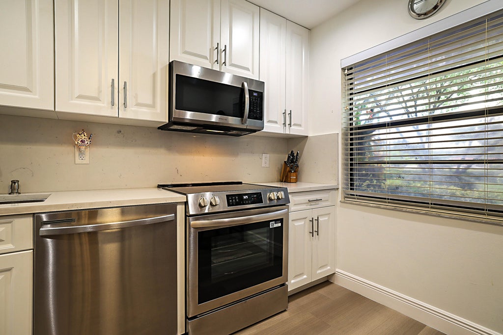 Photo of 21365 CYPRESS HAMMOCK Drive #20K, Boca Raton, FL 33428 (MLS # B26074045)