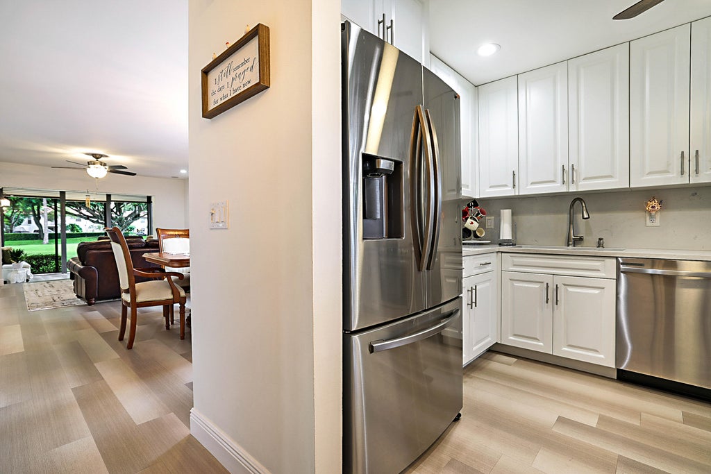 Photo of 21365 CYPRESS HAMMOCK Drive #20K, Boca Raton, FL 33428 (MLS # B26074045)