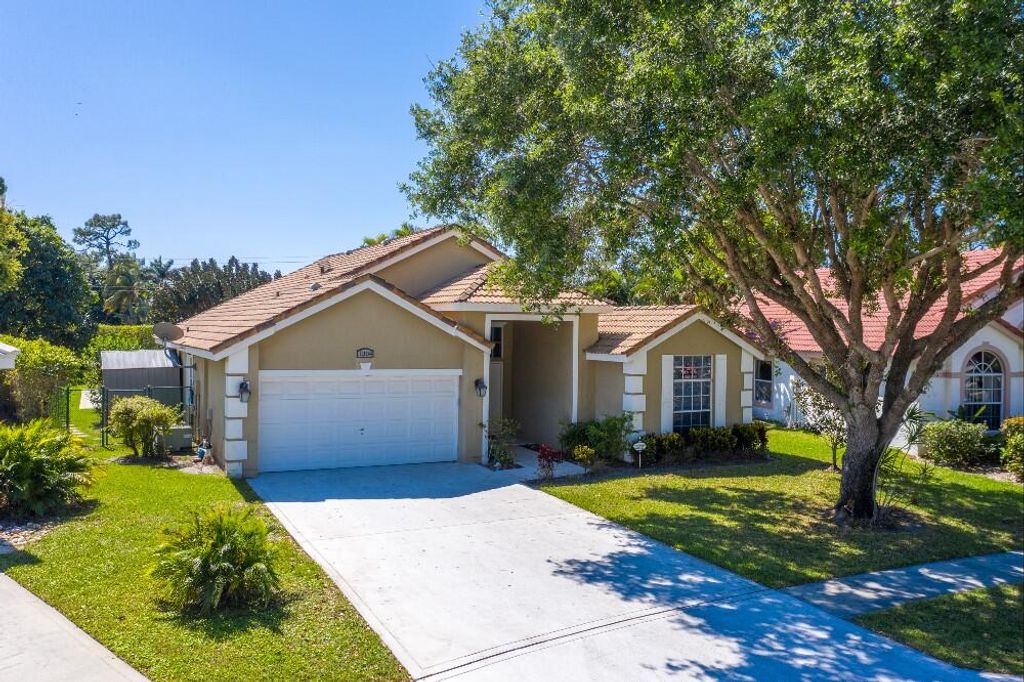 Photo of 1304 Lake Breeze Drive, Wellington, FL 33414 (MLS # R11155703)