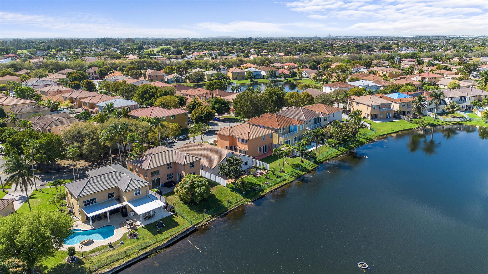 Best Deal in Viscaya with LOW HOA! Beautifully upgraded 4BD/3BA waterfront home in Miramar's sought-after Viscaya community. Enjoy serene lake views with fountain, luxury vinyl flooring, renovated kitchen with quartz countertops & stainless steel appliances. One bed & full bath on the main level. New washer, dryer & water heater. Spacious layout, open-concept living, large backyard, 2-car garage & hurricane shutters. Gated community with 24-hr security, near top schools, dining & highways. Move-in ready!