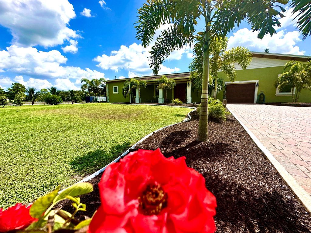 Photo of 16886 W Yorkshire Drive, The Acreage, FL 33470 (MLS # R10919680)
