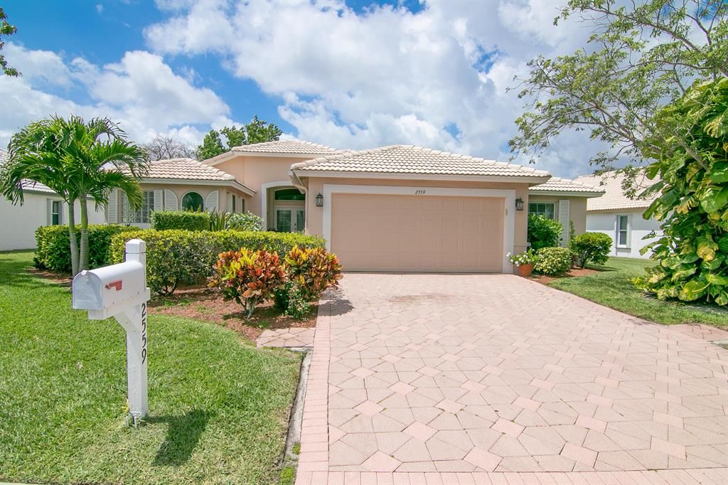 Photo of 2559 Egret Lake Drive Dr, Green Acres, FL 33413 (MLS # R10788809)