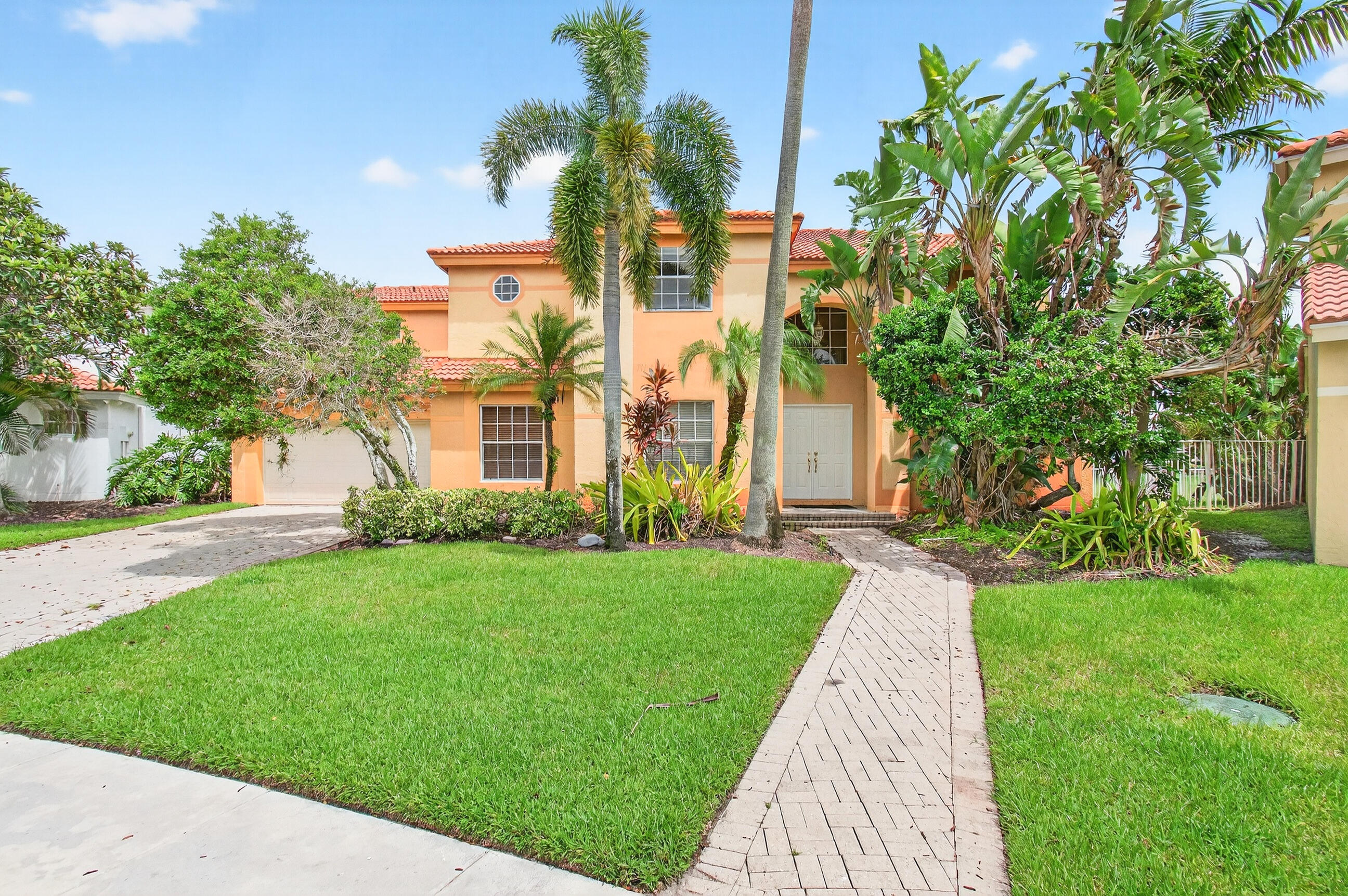 Welcome to this two-story pool home in the gated community of Regatta at Mission Bay! Featuring 4 bedrooms, 4 bathrooms, and nearly 2,800 sq. ft. of living space, this home is perfect for families, with a convenient first-floor bedroom and full bath. Soaring ceilings and a bright, open layout flow seamlessly to the backyard paradise--complete with pool, lanai, and tranquil lake views.Enjoy resort-style amenities at the Mission Bay Clubhouse, including a saltwater pool, jacuzzi, sauna, fitness center with free classes, party rooms, and poolside tiki bar. The Community Park offers basketball and tennis courts, turf soccer fields, playgrounds, and more.
