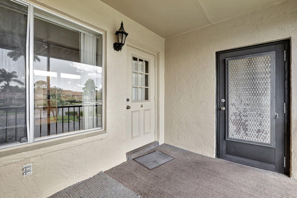 Photo of 237 Pine Hov Circle #A-2, Greenacres, FL 33463 (MLS # R11090342)