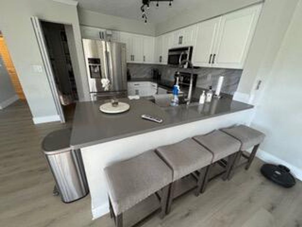 Photo of 11131 SW 17th Manor, Davie, FL 33324 (MLS # R11143989)