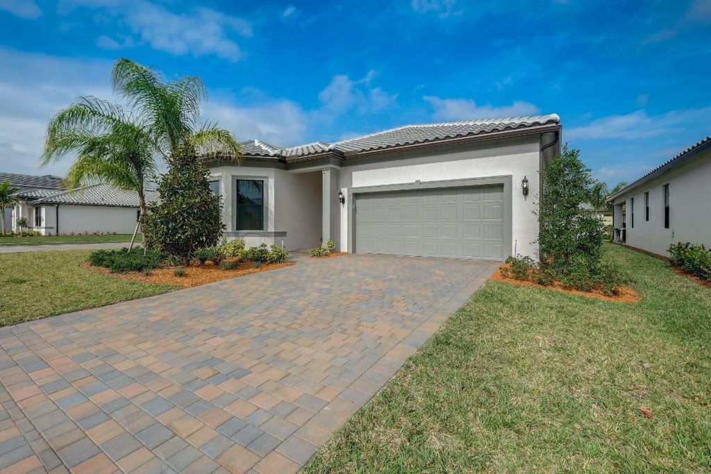 Photo of 837 SE Courances Drive, Port Saint Lucie, FL 34984 (MLS # R11146859)