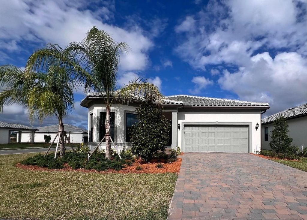 Photo of 837 SE Courances Drive, Port Saint Lucie, FL 34984 (MLS # R11146859)