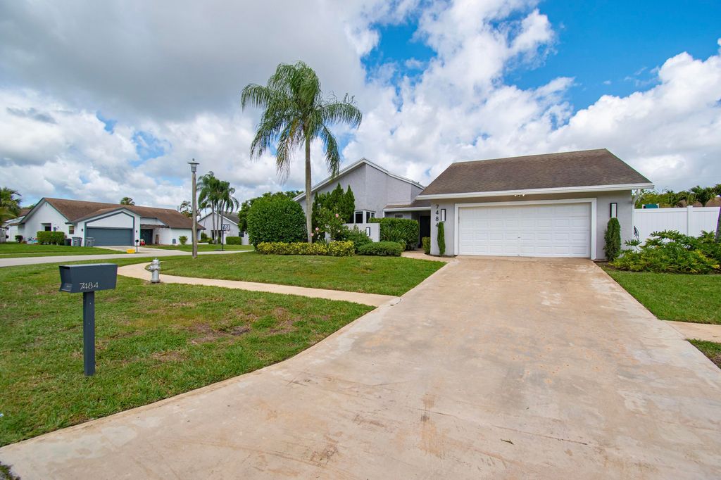 Photo of 7484 Malibu Crescent, Boca Raton, FL 33433 (MLS # B26011374)