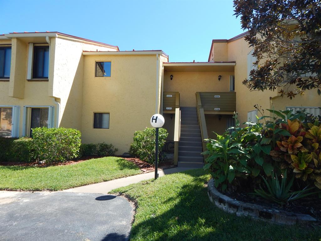Welcome home to Miles Grant Country Club. In close proximity to the Intracoastal Waterways and beaches. Live the country club lifestyle without the steep costs associated with it. This one bedroom, one and half bath condo is updated and well maintained. Newer flooring, a renovated kitchen, and a fresh coat of paint will let the new owner move right in. A new AC and metal roof were both installed in 2019. A new hot water heater was installed November 2021. The condo is steps from the newly renovated community pool. The exterior of the condo was freshly painted in 2016. Miles Grant Phase 2 offers low monthly association fees that include the upkeep of the property, all the exterior structure and includes basic cable.