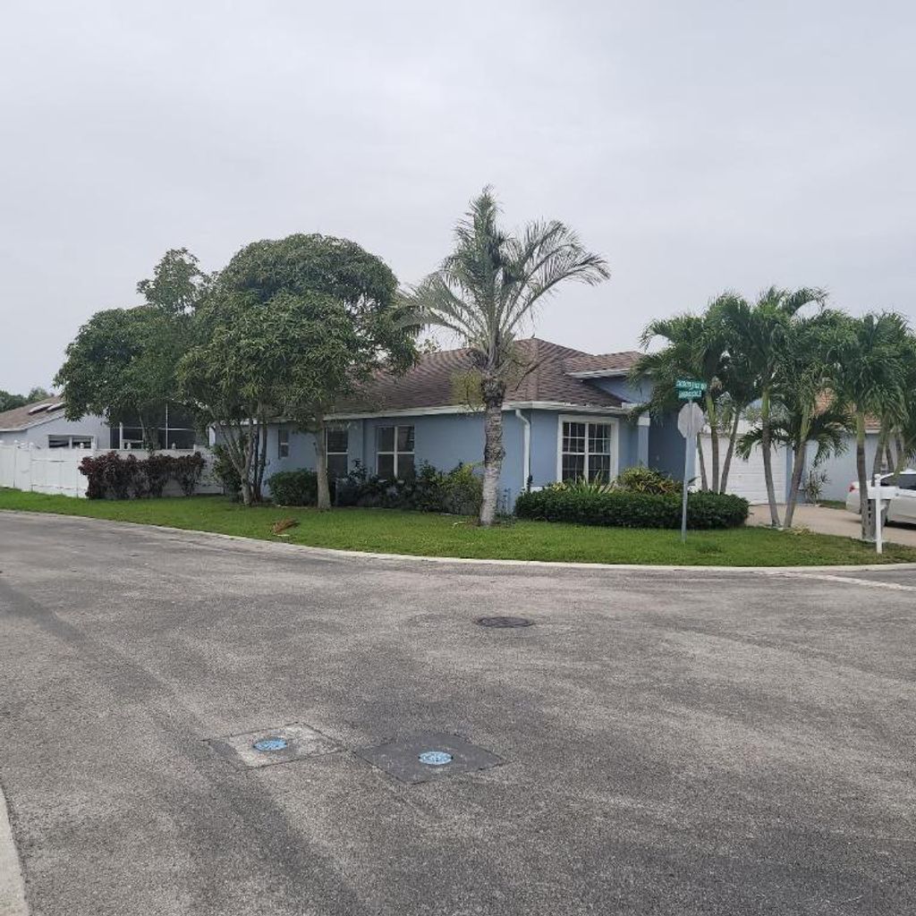 Photo of 1652 Crooked Stick Way, Greenacres, FL 33413 (MLS # R11096725)