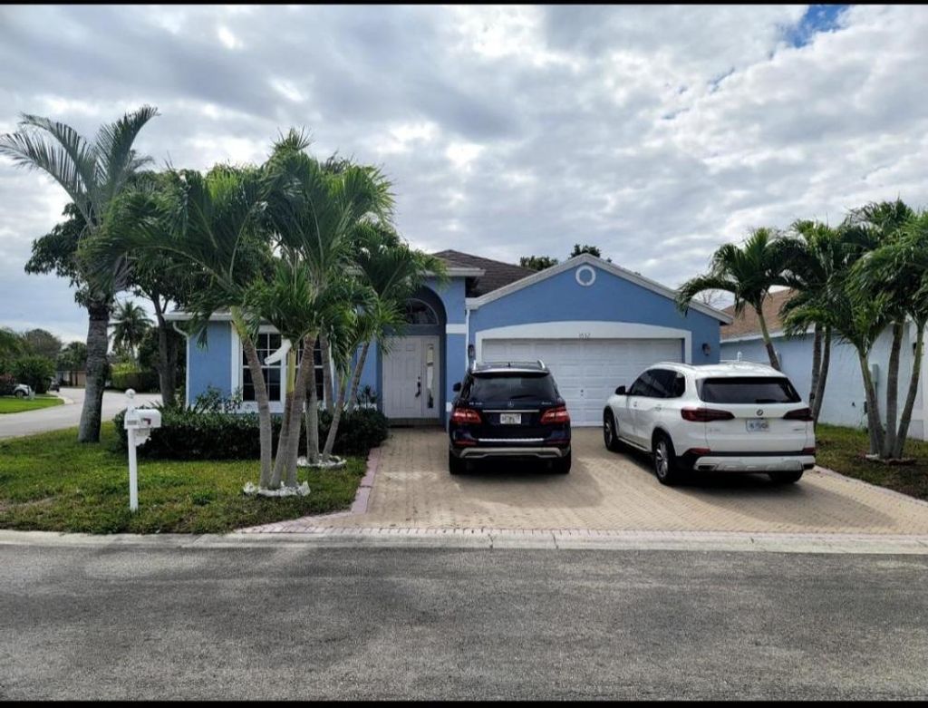 Photo of 1652 Crooked Stick Way, Greenacres, FL 33413 (MLS # R11096725)