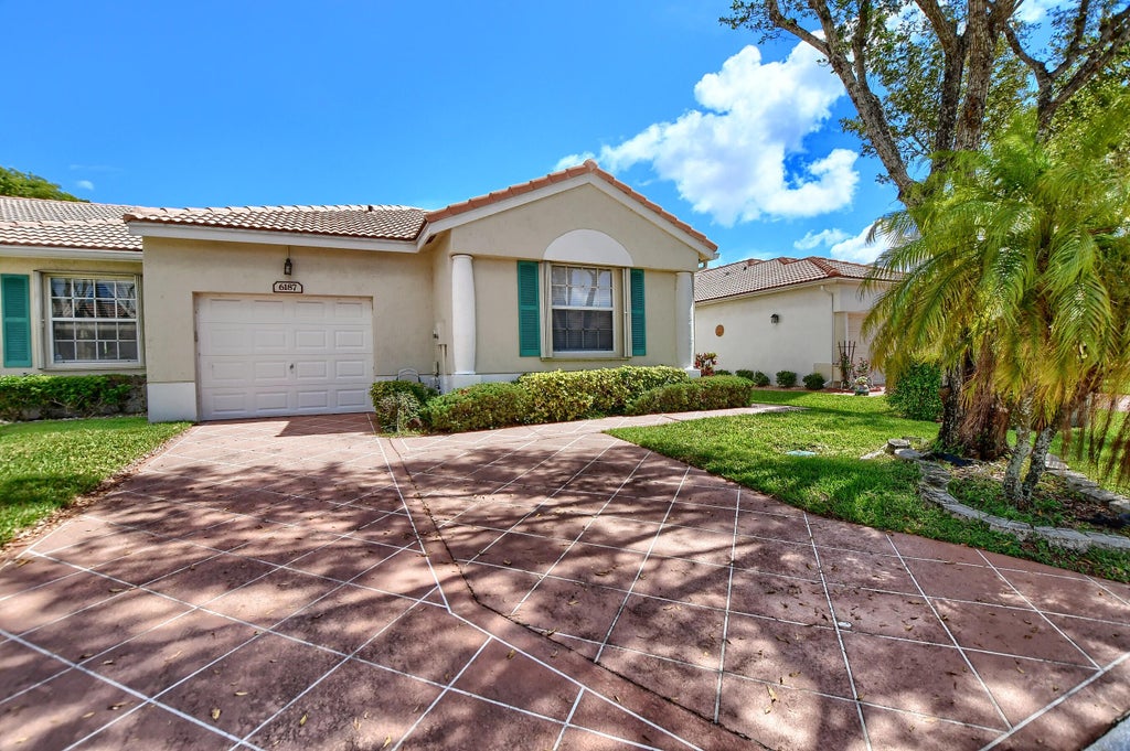 Photo of 6187 Heliconia Road, Delray Beach, FL 33484 (MLS # R10804113)