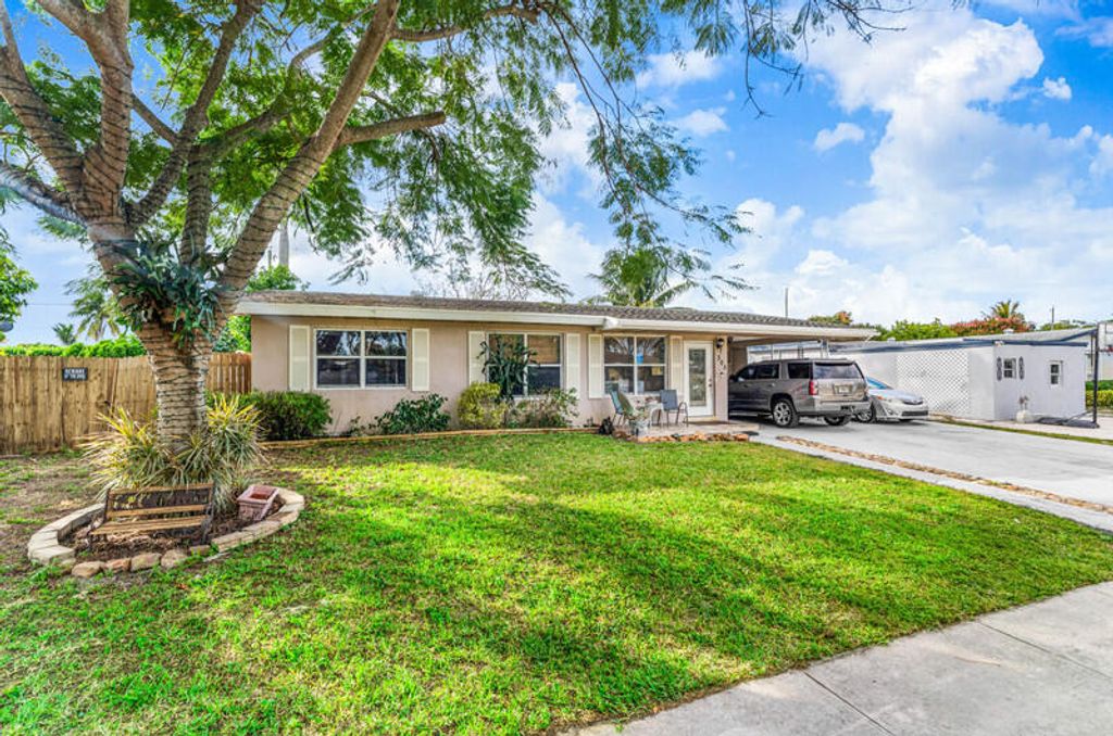 Photo of 305 Henthorne Drive, Palm Springs, FL 33461 (MLS # R11153227)