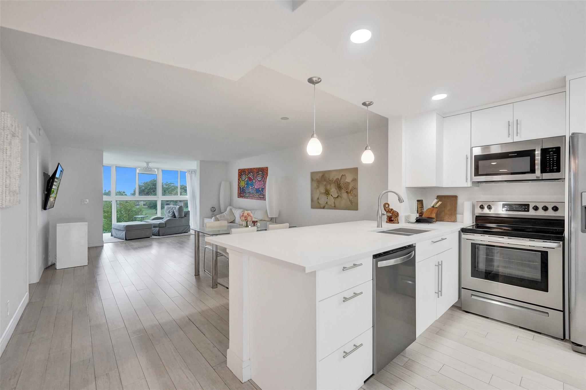 Bright and upgraded 2-bedroom 2-bath condo in a 55+ community, ideally located in the same building as the pool. Enjoy a renovated kitchen, tile flooring, updated baths, enclosed sunroom with golf, lake and pool views, and in-unit washer and dryer. Assigned storage included and rentals permitted. Residents enjoy access to a gym, sauna, library, game room, shuffleboard, and more.