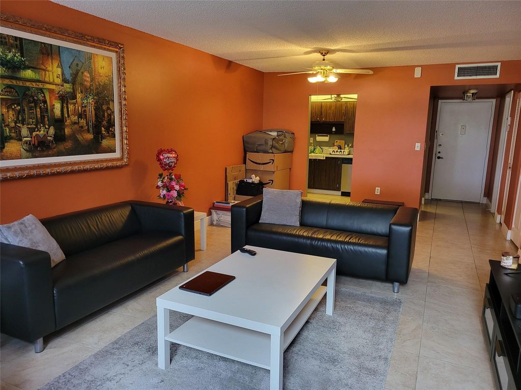 Photo of 1400 Saint Charles Place #211, Pembroke Pines, FL 33026 (MLS # F10422367)