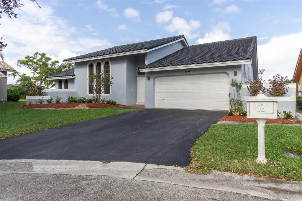 Photo of 5656 NW 64th Lane NW, Coral Springs, FL 33067 (MLS # R10765567)