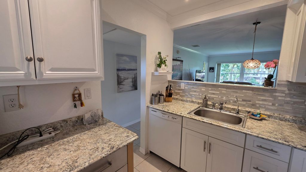Photo of 5161 W Oakland Park Boulevard #206, Lauderdale Lakes, FL 33313 (MLS # B26027618)