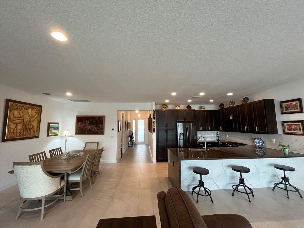 Photo of 11711 SW River Crossing Pl, Port St Lucie, FL 34987 (MLS # F10504853)