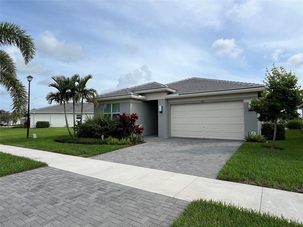Photo of 11711 SW River Crossing Pl, Port St Lucie, FL 34987 (MLS # F10504853)