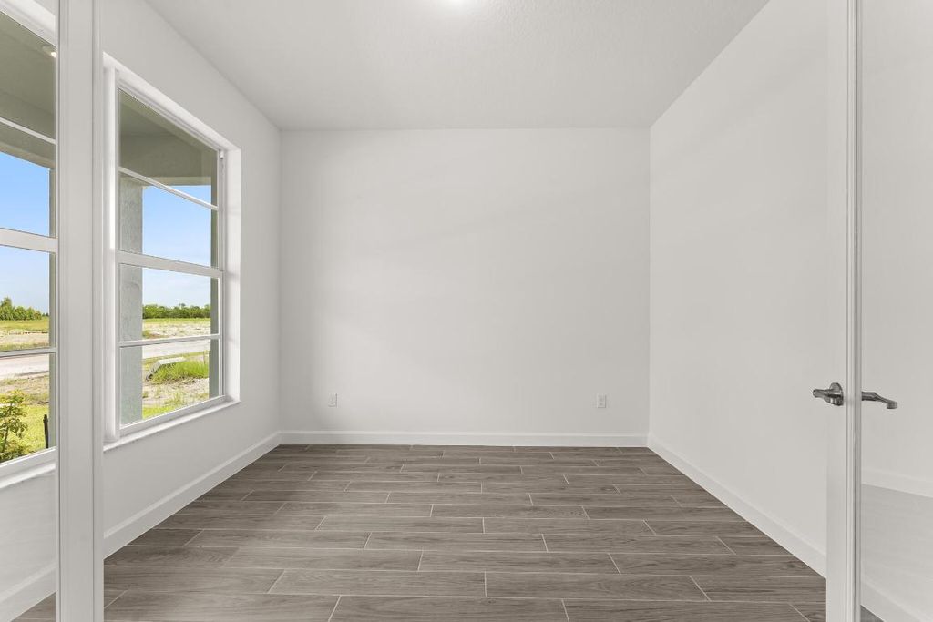 Photo of 9707 SW Indra Way, Port Saint Lucie, FL 34987 (MLS # R11109590)