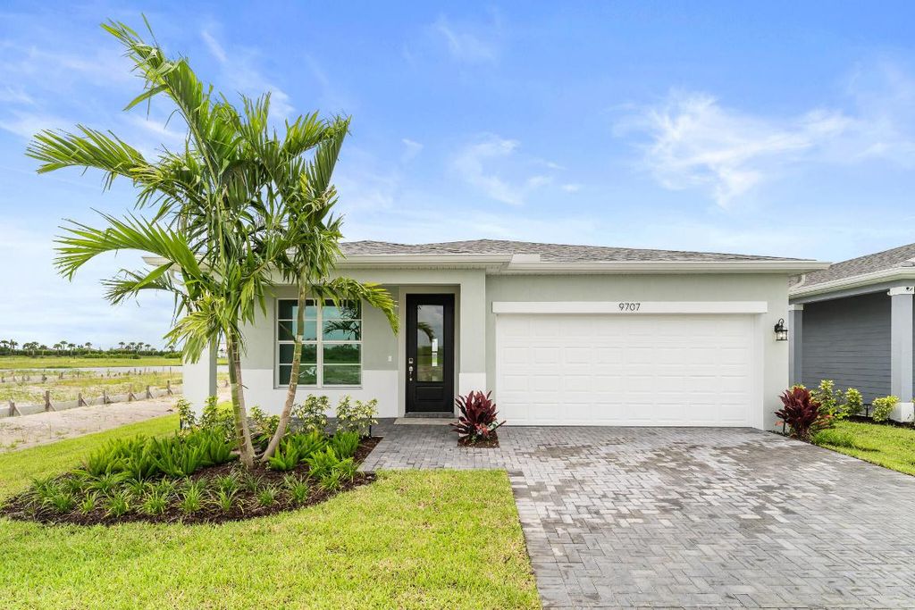 Photo of 9707 SW Indra Way, Port Saint Lucie, FL 34987 (MLS # R11109590)