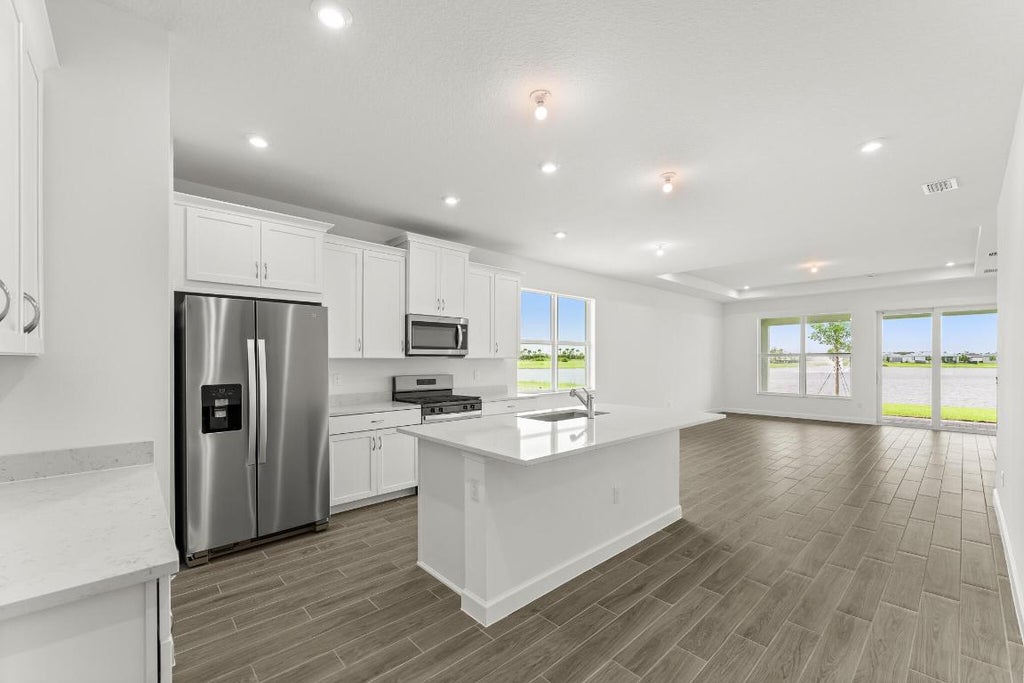 Photo of 9707 SW Indra Way, Port Saint Lucie, FL 34987 (MLS # R11109590)