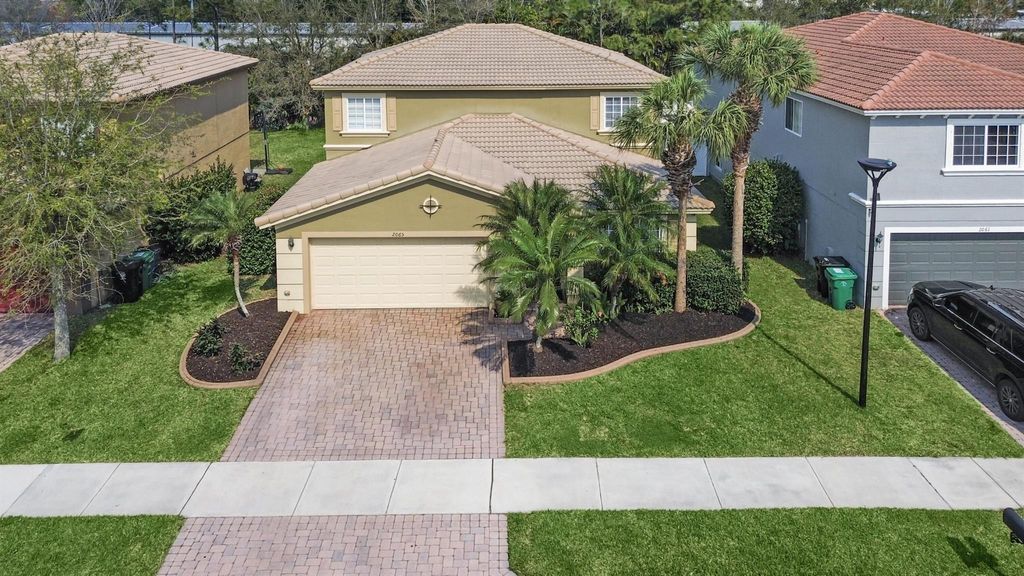 Photo of 2065 SW Marblehead Way, Port Saint Lucie, FL 34953 (MLS # R10962852)