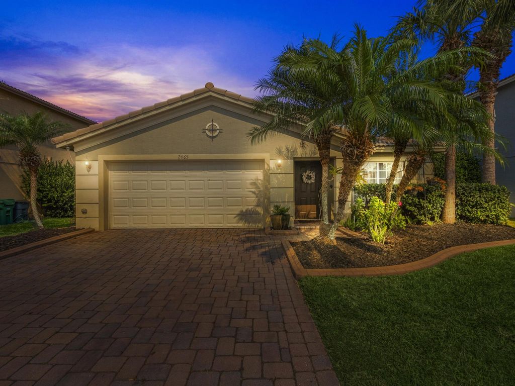 Photo of 2065 SW Marblehead Way, Port Saint Lucie, FL 34953 (MLS # R10962852)