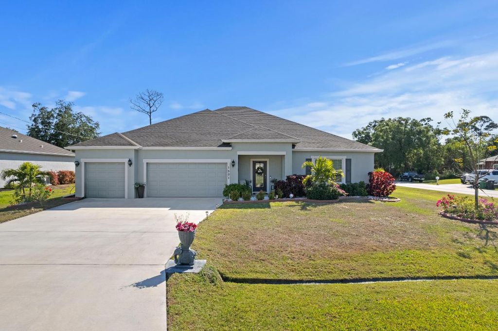 Photo of 1501 SW Neponset Road, Port Saint Lucie, FL 34953 (MLS # R11084235)