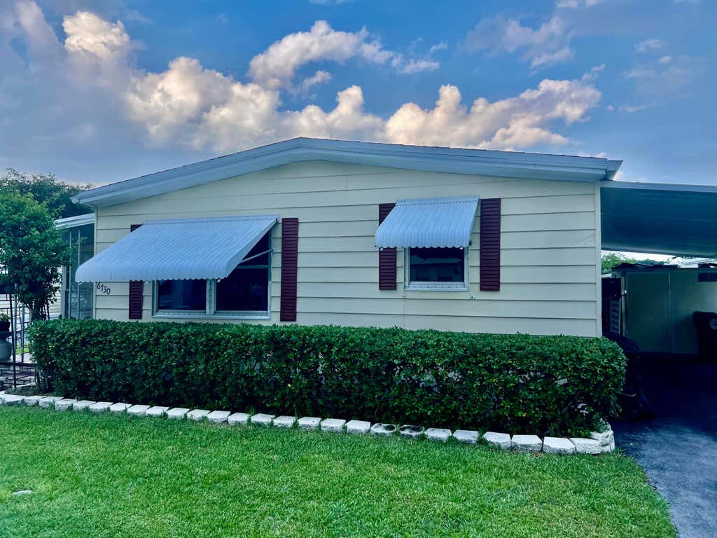 Photo of 6730 NW 45th Ter #Lot Q-04, Coconut Creek, FL 33073 (MLS # B26042525)